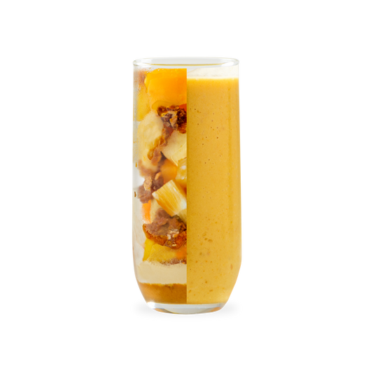 PACK'D Peanut butter tropical protein smoothie kit, glass half fruit and half smoothie